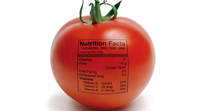 Tomate mit aufgedruckter Formel